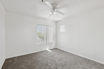 Grey floor with ceiling fan